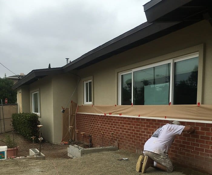 Action Shot of Preparation and Masking Work on an Exterior Painting Project in San Diego