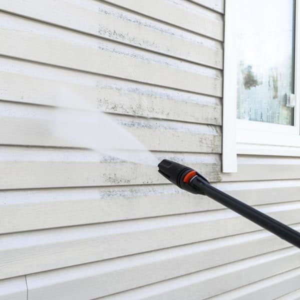 Pressure washing a house Procoat Painting San Diego