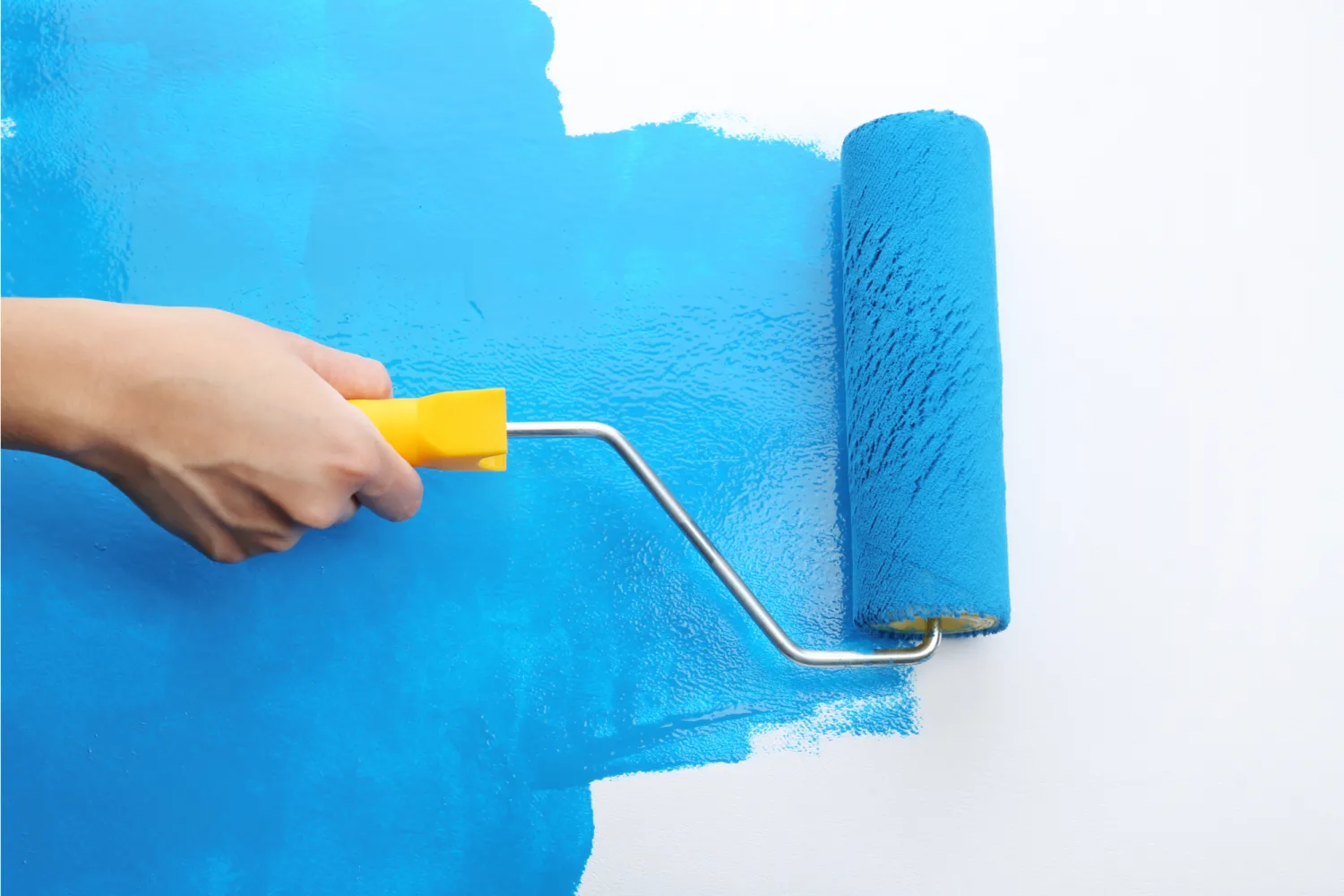 Painter painting wall with roller Procoat Painting San Diego - This is the ultimate guide to house painting. Everything involving house painting has been covered so that house painting can be done easily by you. - Painting Fences, Gates, & Garages by Procoat Painting San Diego We offer you a complete line of professional interior and exterior painting services.