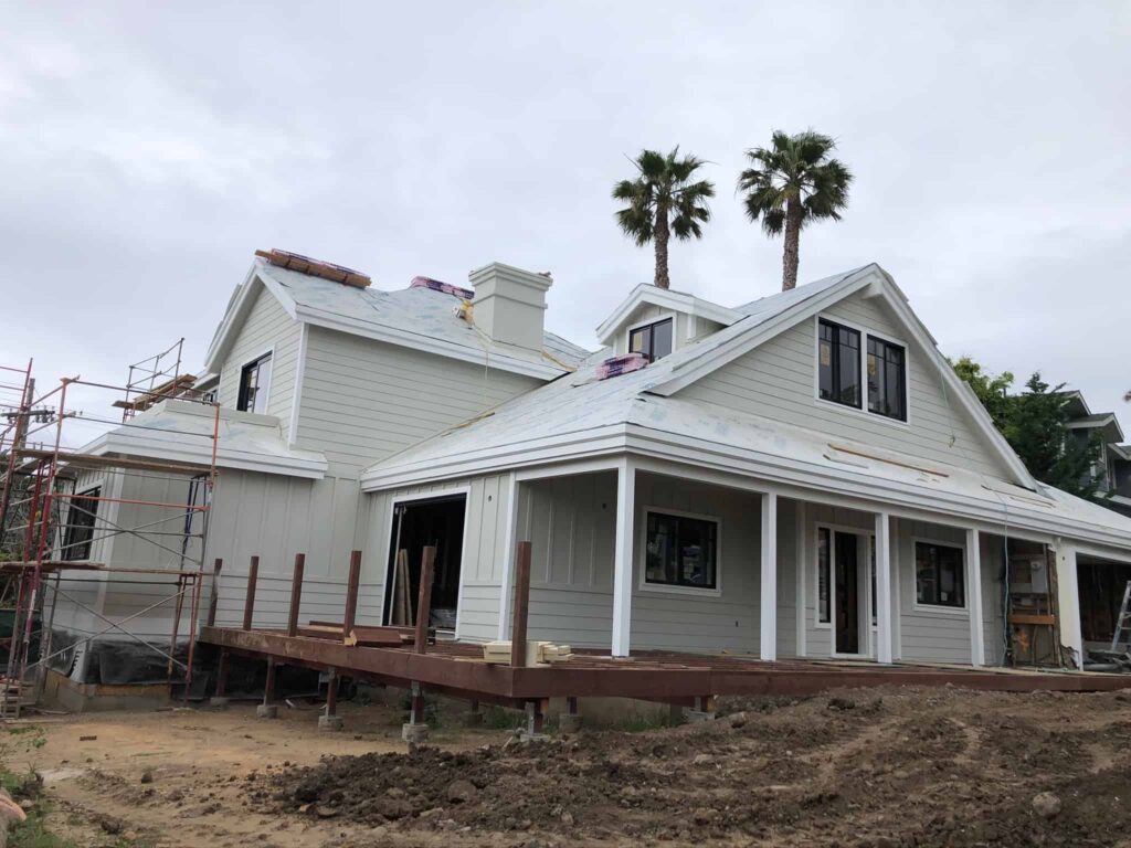 White Painted Residential Home Exterior Painted residential porch and exterior after professional work