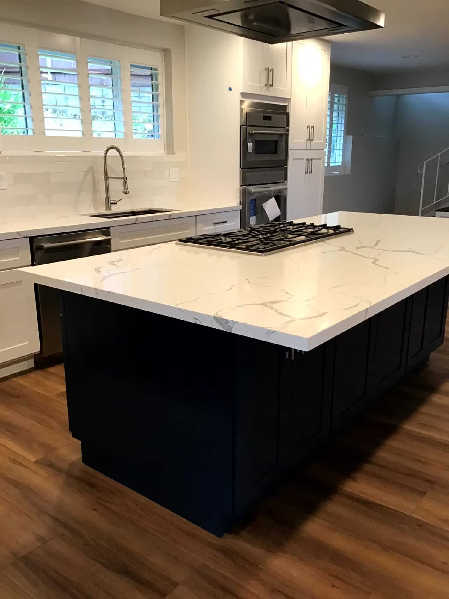 Modern kitchen with painted island and cabinetry — Procoat Painting