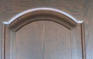 painting over stained wood cabinets