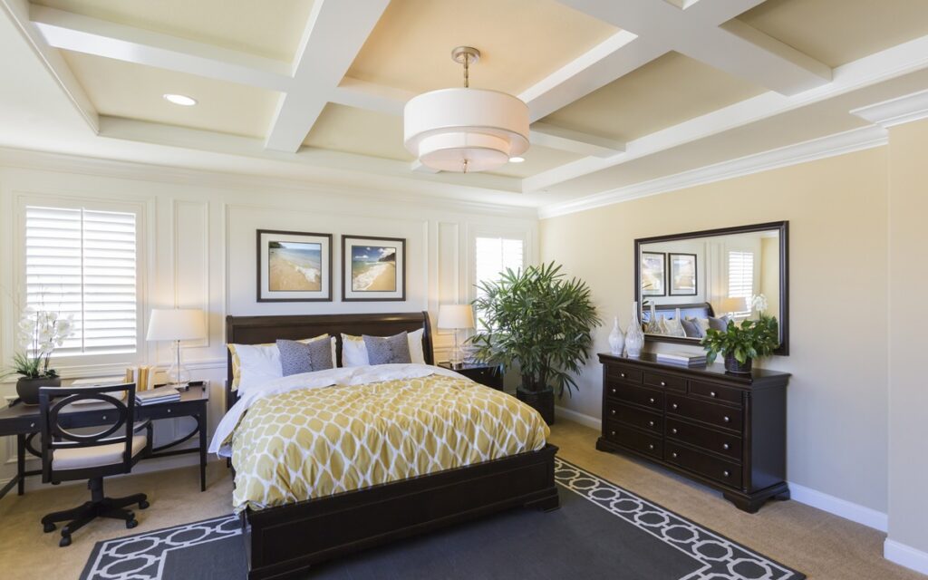 Interior of A Beautiful Master Bedroom Painted commercial interior with light walls, reception desk, and glass partitions